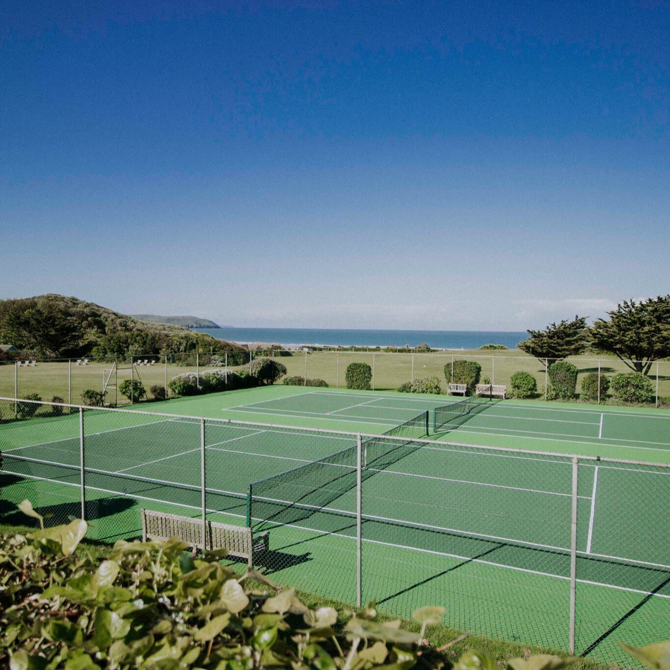 Tennis courts with views of the coast