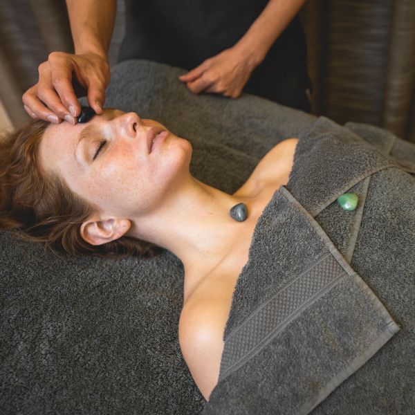 Woman having GAIA Crystal Therapy