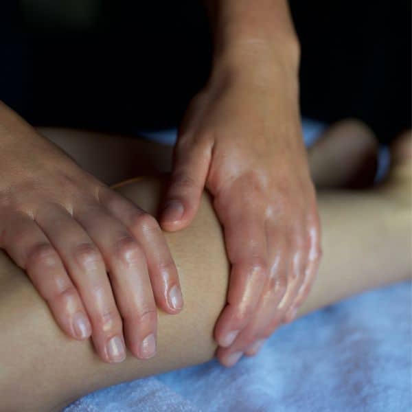 Person having leg massaged at a spa